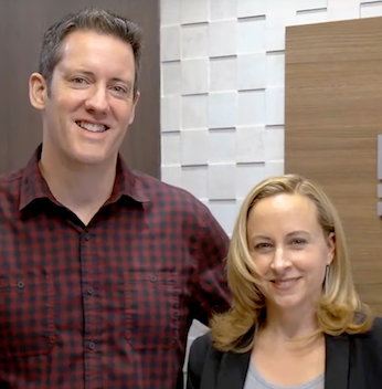 Group of veterans A group of ten veterans, mostly wearing blue shirts with a logo and baseball caps (some with "USMC"), pose in front of a stone memorial engraved with text including "IN HONOR AND MEMORY THE MEN OF THE..." and names of conflicts like "VERA CRUZ 1914," "HAITI 1915-1934," and "WORLD WAR I 1917-1918 BELLEAU WOOD SOISSONS."
