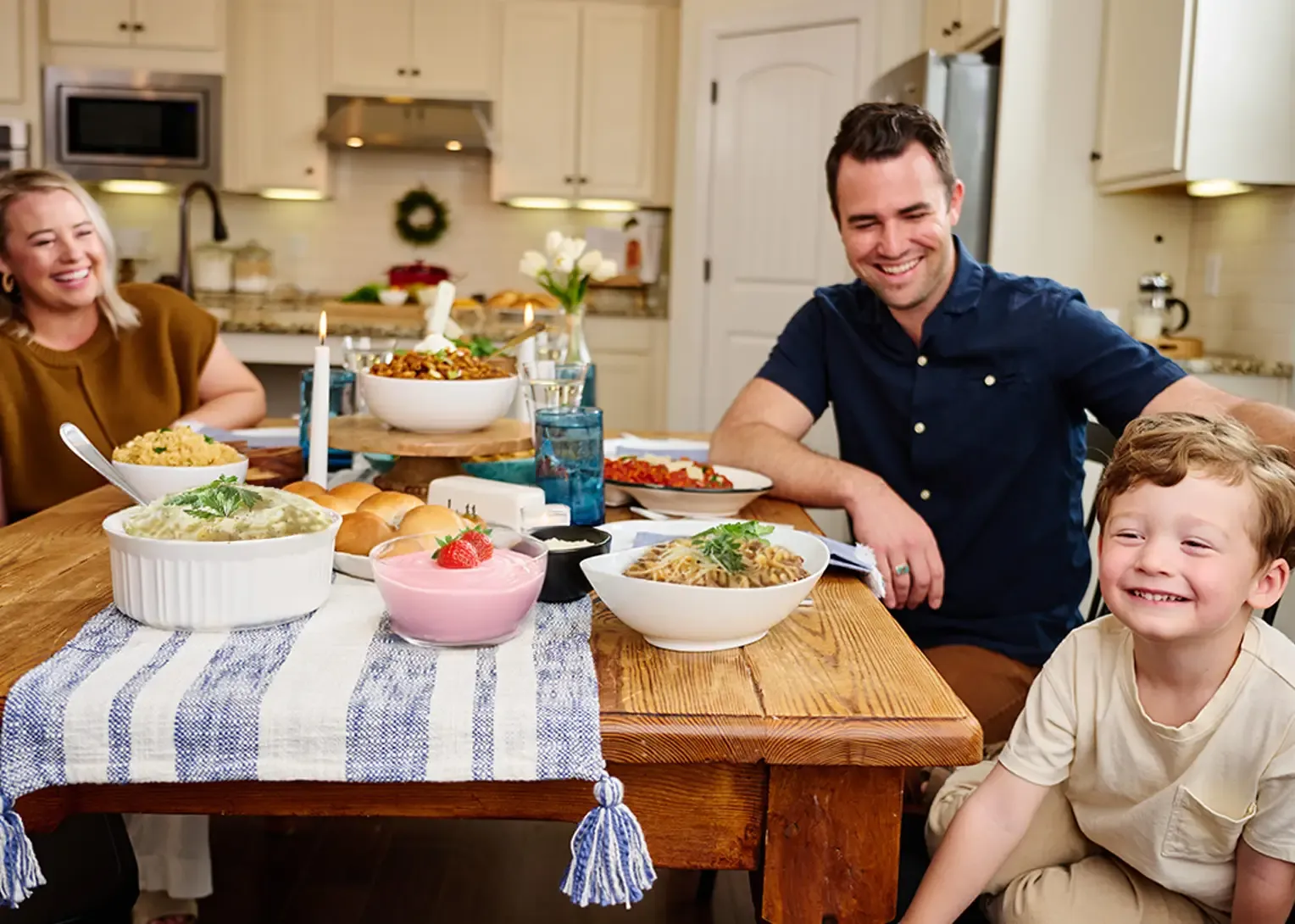 Instant Independence Premium Survival Food Kit A family sitting around the dinner table with food all made from the NEW Instant Independence Premium Survival Food Kit