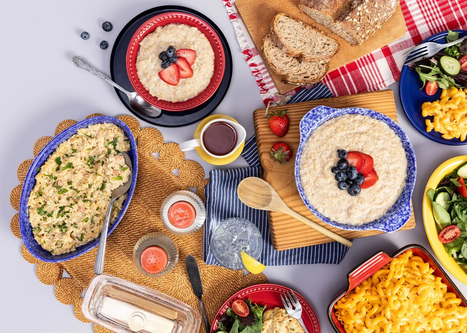 3 Month Food Kit A woman setting a table with multiple food kits made from the 3-Month Survival Food Kit