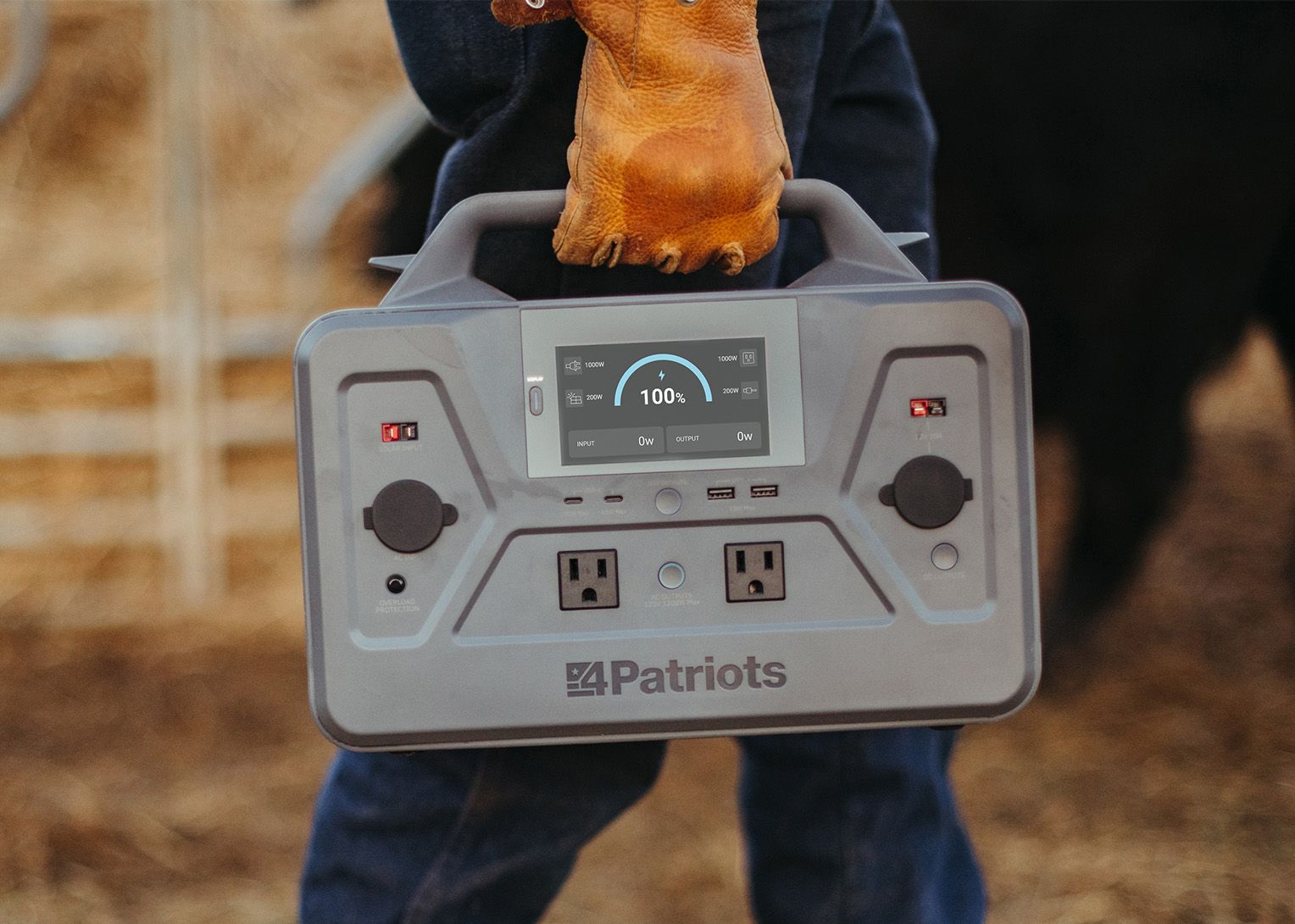 Patriot Power Solar Generator 1200 4Patriots Patriot Power Solar Generator 1200 with a digital display showing 97% battery charge, powering a refrigerator in the background where a man is retrieving food.