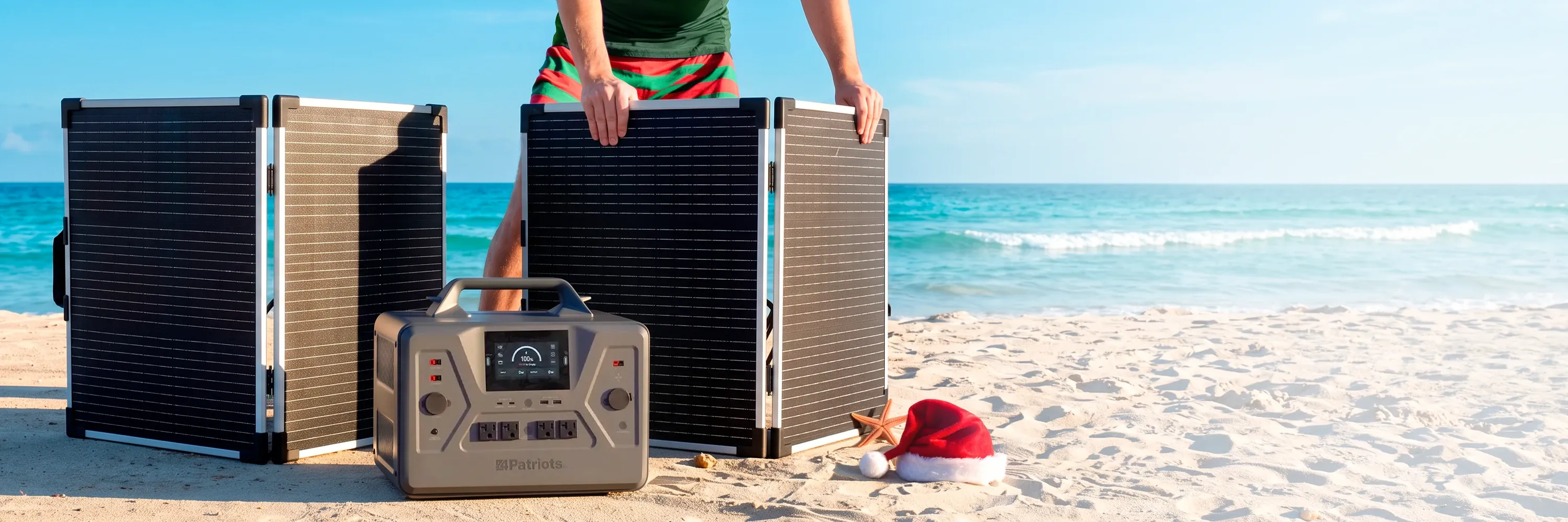 A man setting up his Solar Generator 2200X on the beach with 2 solar panels to celebrate a Christmas in July special.